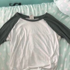 Green and white long sleeve shirt.